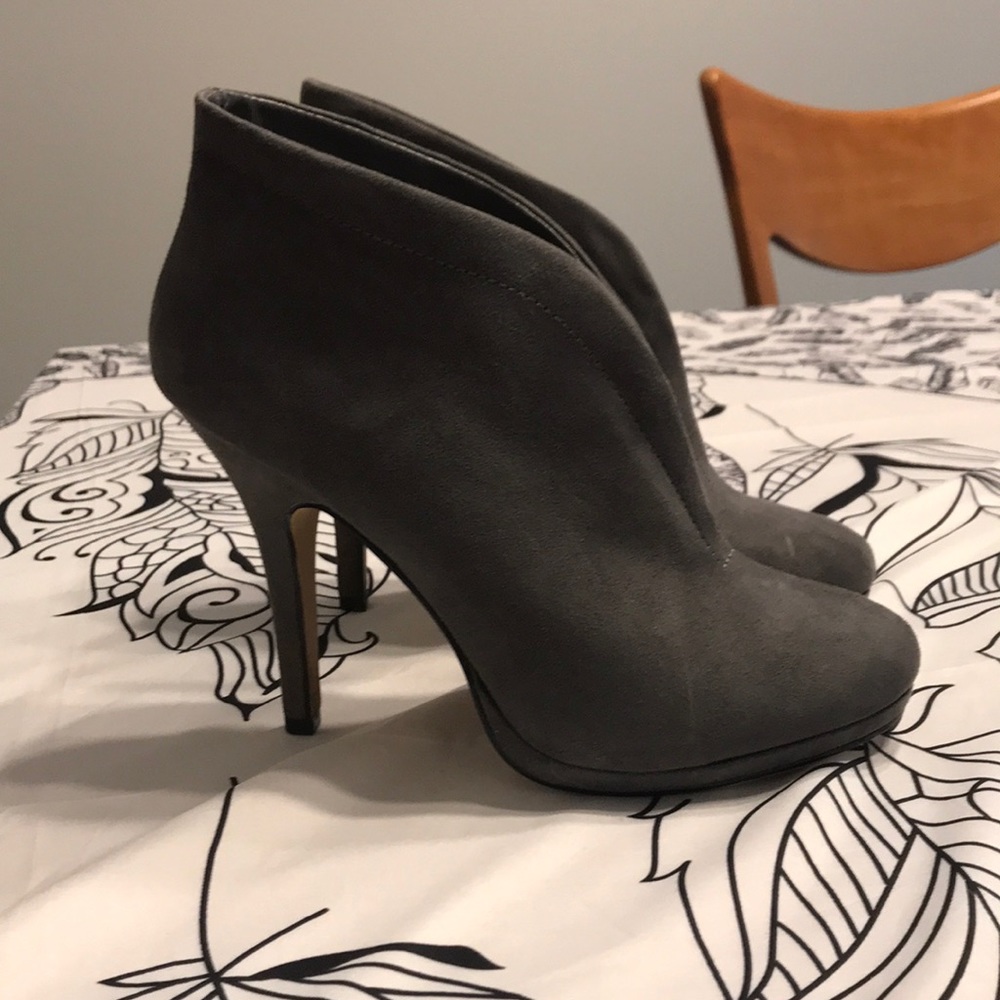 Women’s grey high heel booties.